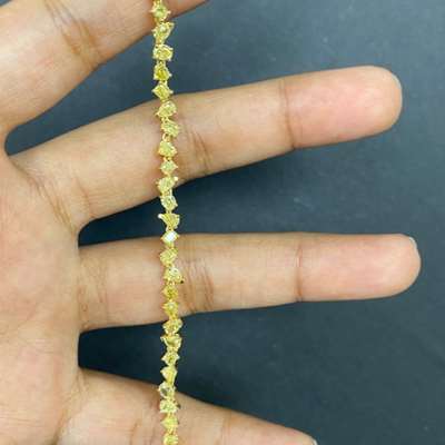 Natural fancy yellow mix shape full tennis bracelet set in 18k yellow gold