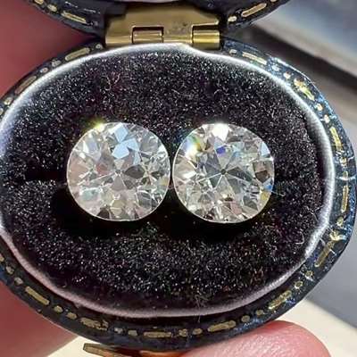 A Genuine Antique Matching pair of 1.99ct & 2.08ct Old European Cut Diamonds.