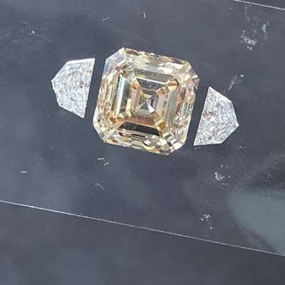 Part payment 2- 3.01ct natural peachy brown asscher cut vvs2 clarity diamond + 0.41ct e color vvs2 caddilac pair