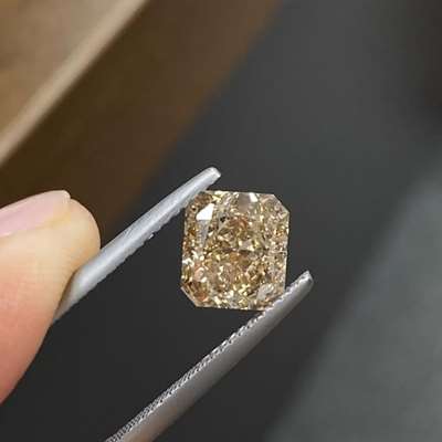 3.28ct GIA Certified Natural Fancy Yellowish Brown VS1 Clarity Long Radiant Cut Diamond