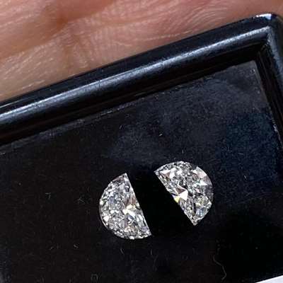 0.42cts total weight pair of Natural F color VVS clarity half moon shoulder stone diamonds