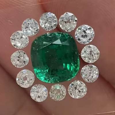 2.55ct GIA-certified natural Zambian emerald, cut into a plush cushion shape,12 genuine antique Old European-cut diamonds totaling 1.30 carats,