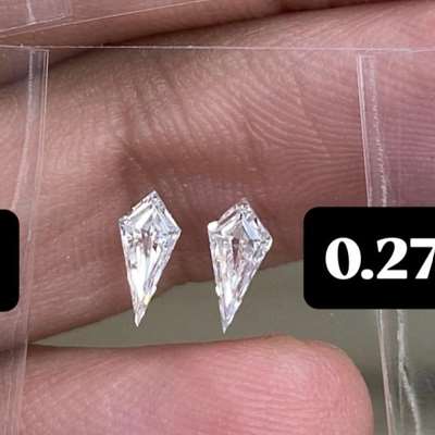 0.27ct total weight  Natural F Color  - VVS2 Clarity  - Identical kite cuts—perfect for symmetrical designs