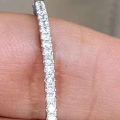 Natural FG VVS VS round diamonds in a simple half tennis bangle