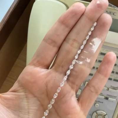 A 3.97cts total weight parcel of 31pcs Natural M color, faint brown VS clarity pear and marquise shape diamonds.