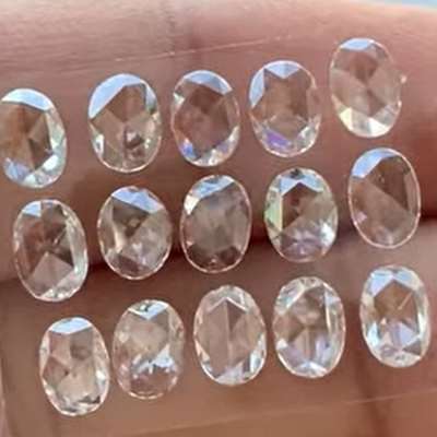 2.81cts total weight 15 pcs natural G color VS2 clarity rosecut oval diamond layout that feels perfectly balanced.