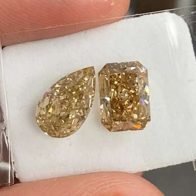 2.01ct Natural Honey Brown Radiant Diamond  SI1 clarity and  2.10ct Natural Champagne Brown Pear Diamond  VS2 clarity