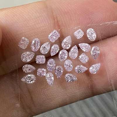  25 little treasures, together, they weigh 2.10cts, a mix of fancy shapes in VS–SI clarity, lit up with the softest blush of pink.