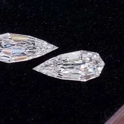 0.50cts & 0.50cts GIA certified Natural E & G color VS2 clarity step cut pear shape diamond