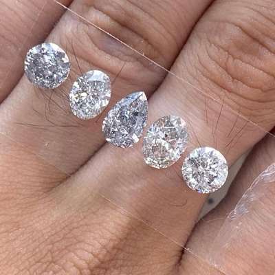 5.05ct layout of natural salt & pepper diamonds From the soft curves of the pears and ovals