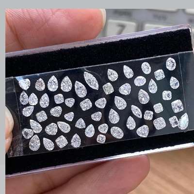 Marquise, heart, oval, square, pear, together making 4.56 carats of pure, mix-white brilliance HI color SI clarity