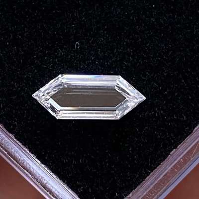 0.90cts.  gia certified D color. VS1 clarity super rare long hexagon portrait cut.