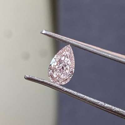  0.44 carat pear-shaped whisper in fancy brownish pink  VS2 clarity 