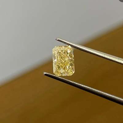  A 0.80ct natural brownish yellow radiant cut,  SI2 clarity,