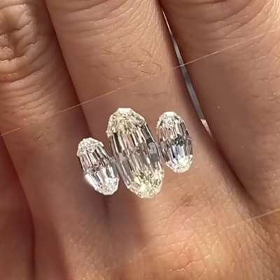 1.50ct GIA Certified Natural L zColor VVS1 Clarity Moval Shape Step Cut Diamond along With Matching Pair of Natural 0.50ct & 0.55ct GIA Certified G & H Color VS1 Clarity movals.