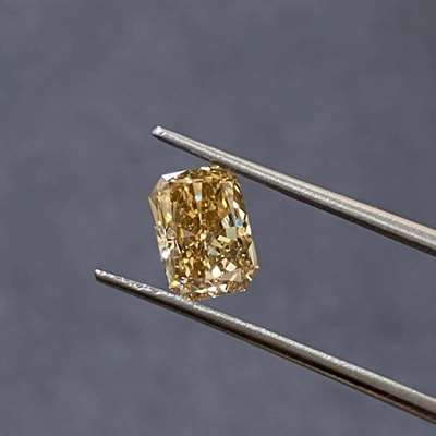 1.50cts of pure charm in this natural honey brown radiant. vs1 clarity