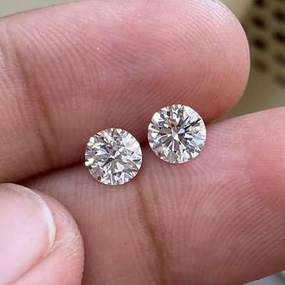  pair of 0.56ct and 0.57ct GIA certified natural F color VVS1 clarity old European cut diamonds