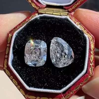 Its a 1.59ct GIA Certified H VS1 Elongated Old Cut Cushion Along With 1.51ct i Color VVS2 Clarity Egg Shape Old Cut Pear Shape Diamond.