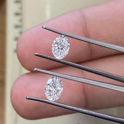 matched pair of GIA certified oval diamonds, each weighing 0.50ct With rare D color and a combination of VS1 and VVS2 clarity