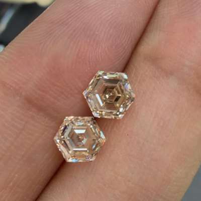  Natural 2.07cts matching pair of natural peachy brown VS Clarity step cut Hexagon Shape diamonds