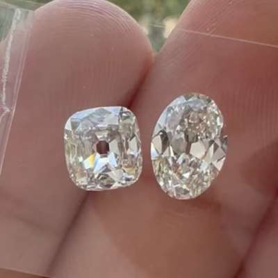 1ct GIA certified natural L color, faint brown SI1 old cut cushion with 0.99ct GIA certified natural K color, faint brown VS1 old cut ova