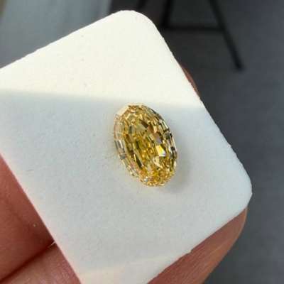 1.69ct GIA Certified Natural Fancy Orangy Yellow SI2 Clarity Oval Shape Step Cut Diamond