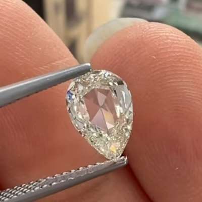1.00ct GIA Certified Natural K Color VVS2 Clarity. Super high dome pear shape Rosecut diamond