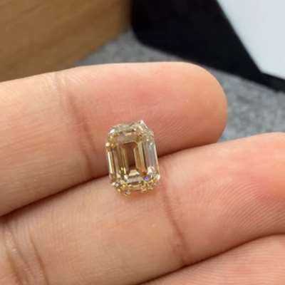 2.67cts natural yellowish brown VS1 emerald cut diamond 