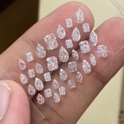 A beautifully curated 3.84ct parcel of 33 natural light brownish pink VS-SI diamonds