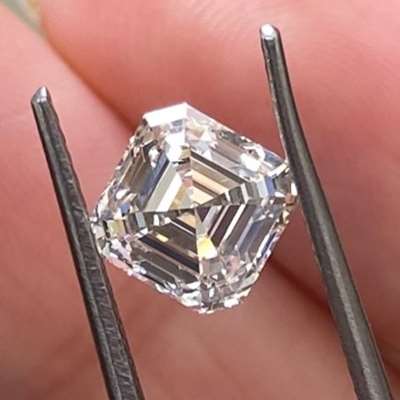 1.51 carat natural brown Asscher cut diamond, in the O-P color range with VVS2 clarity 