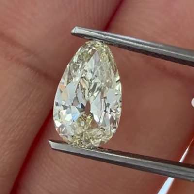 A 1.17cts GIA certified Natural M color VS1 clarity old cut egg shape diamond