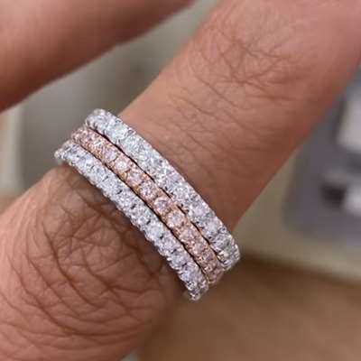 White diamond eternity rings in 18k white gold